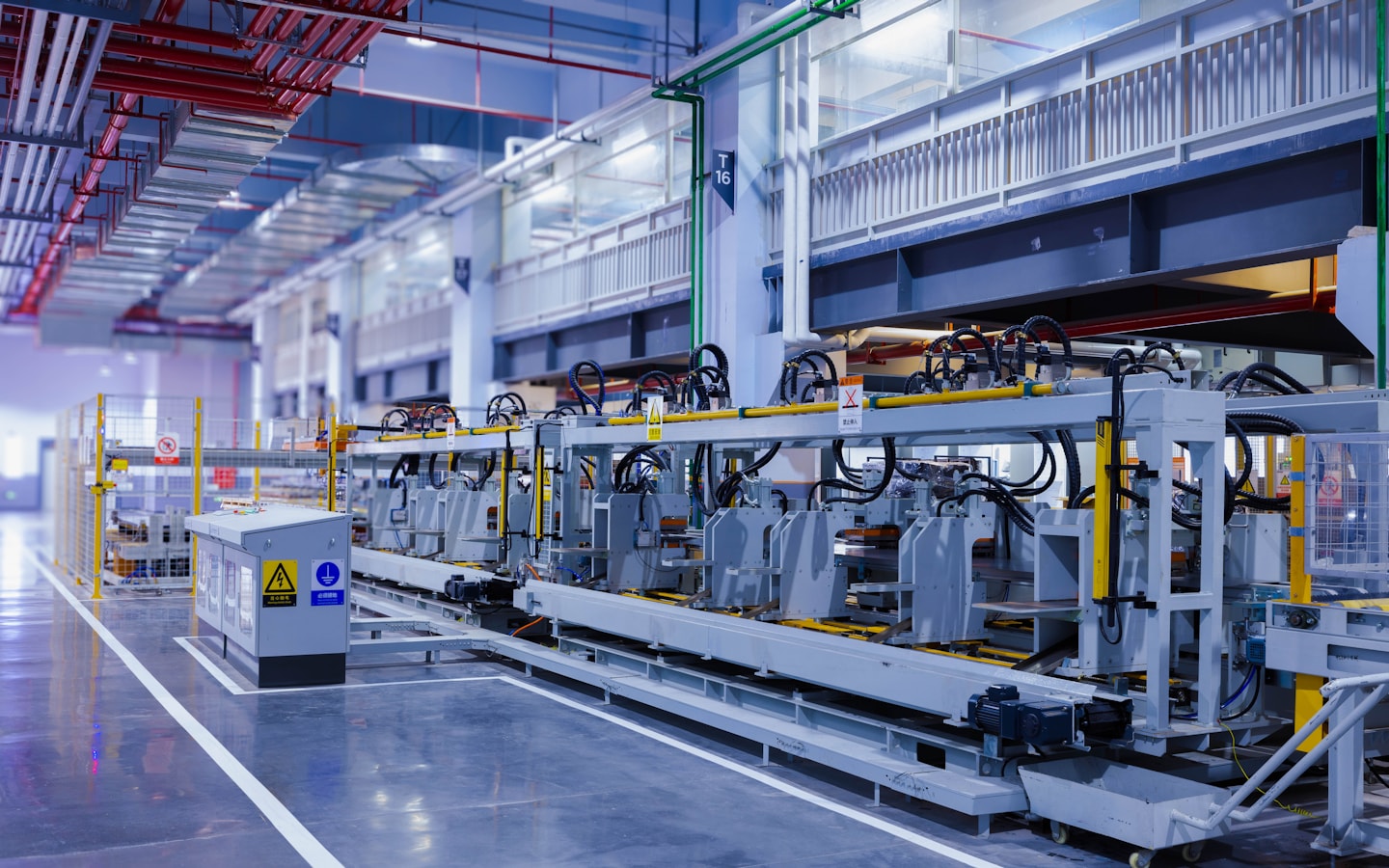 An automated production line inside an operating manufacturing plant