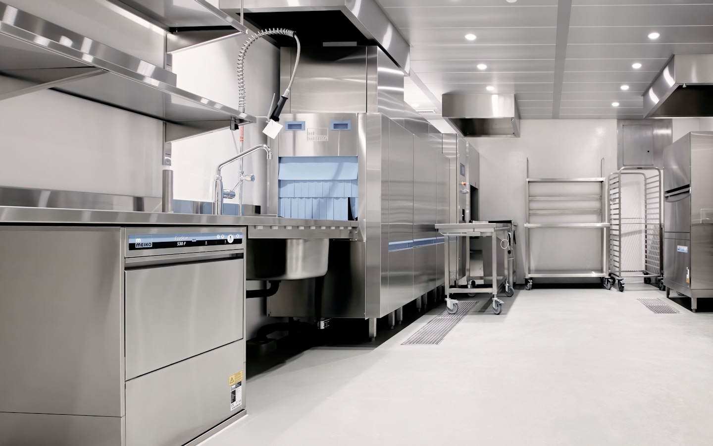 A professional commercial kitchen where sanitation chemistry is used daily